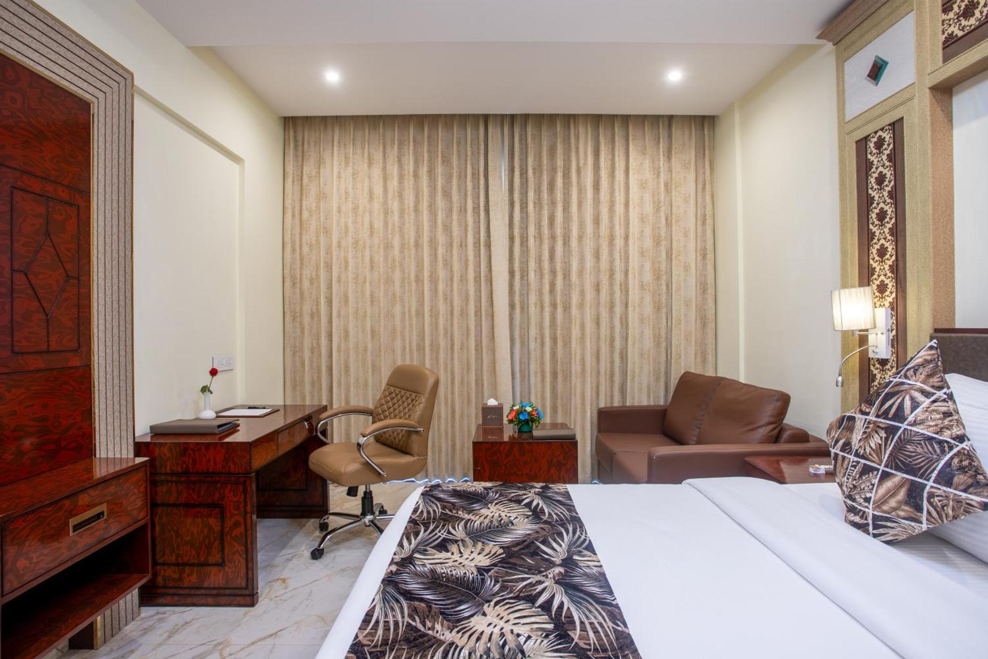 The Avenue Grand Hotel กาลังกูติ ห้อง รูปภาพ