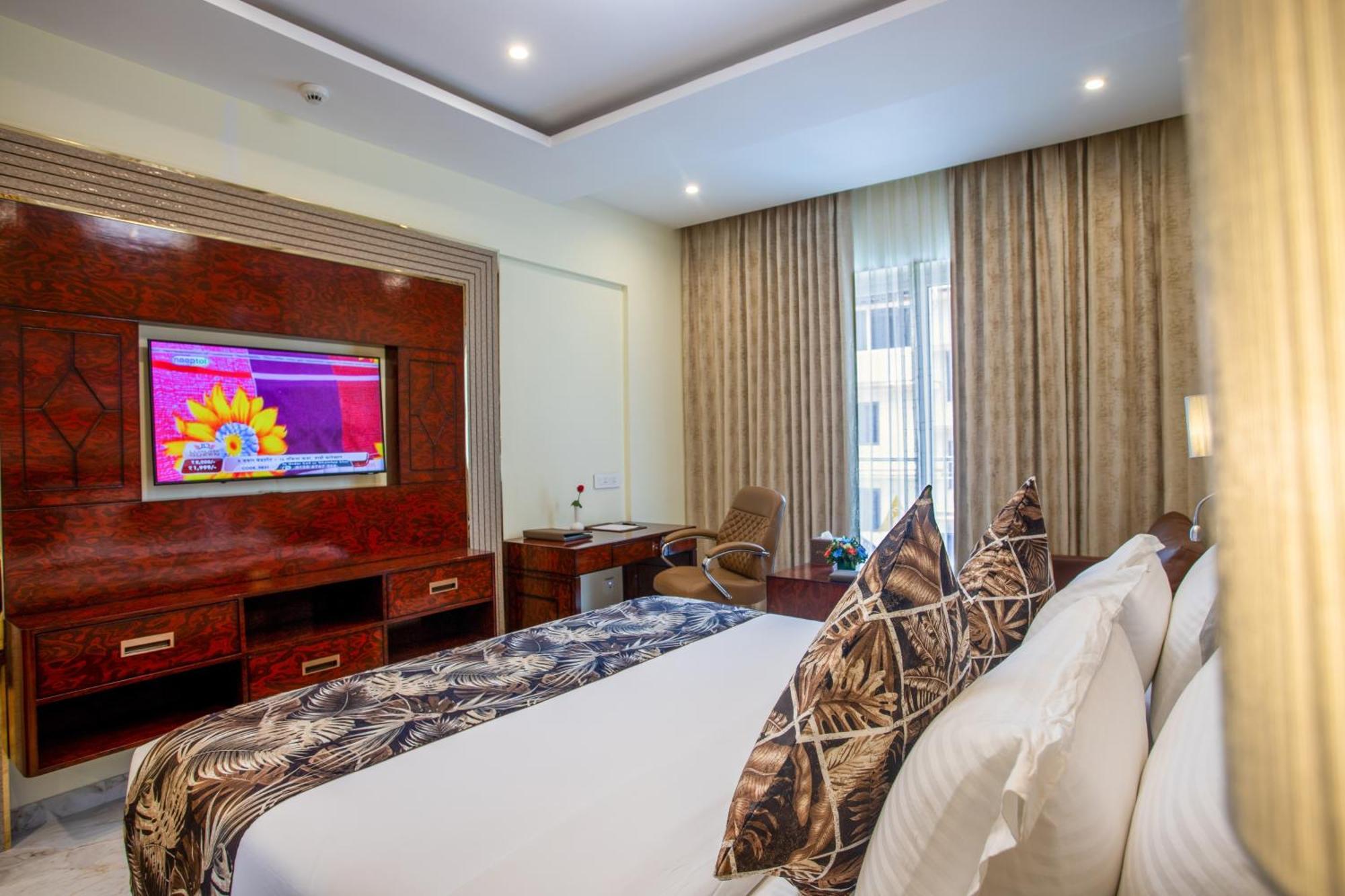 The Avenue Grand Hotel กาลังกูติ ห้อง รูปภาพ